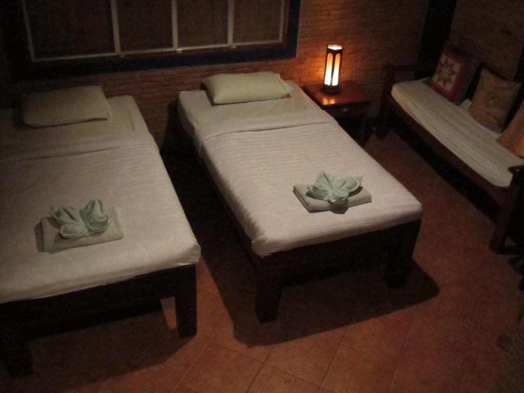 Orchid Hibiscus Guest House Сукотаи Номер фото
