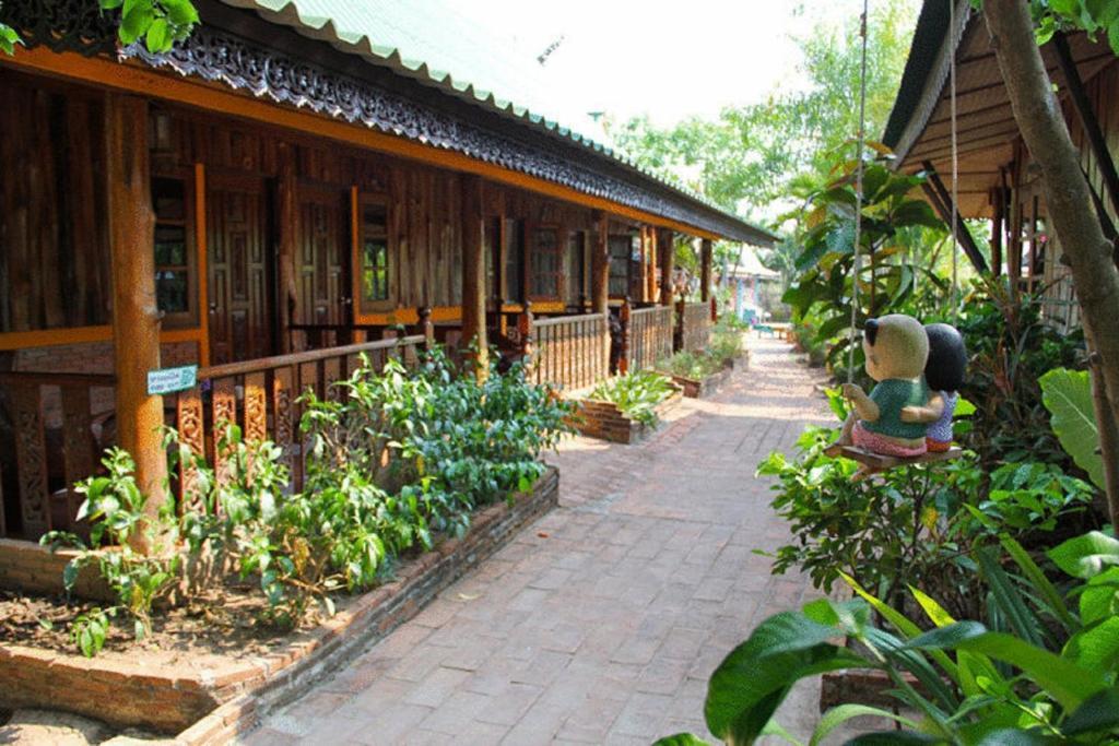 Orchid Hibiscus Guest House Сукотаи Номер фото